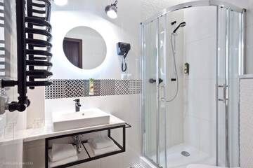 Фото номера Двухместный номер с 2 отдельными кроватями Отель Hotel Justyna г. Краков 26