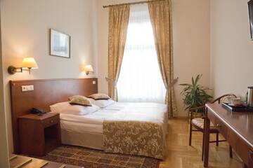 Фото номера Двухместный номер с 2 отдельными кроватями Отель Hotel Polonia г. Краков 5
