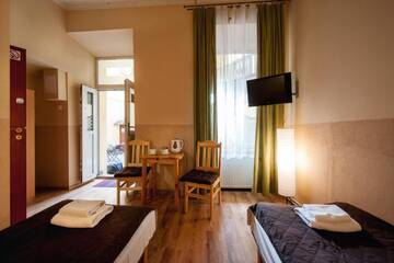 Фото номера Двухместный номер с 2 отдельными кроватями Апарт-отели Station Aparthotel г. Краков 7