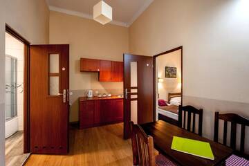 Фото номера Четырехместный номер Апарт-отели Station Aparthotel г. Краков 3