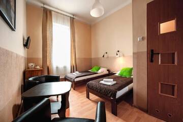 Фото номера Двухместный номер с 2 отдельными кроватями Апарт-отели Station Aparthotel г. Краков 4