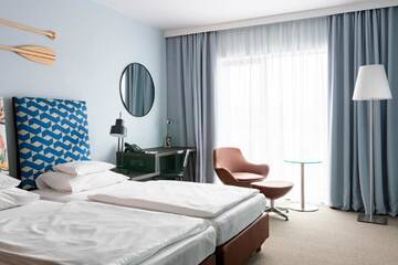Фото номера Двухместный номер с 2 отдельными кроватями Отель Vienna House Andel’s Cracow г. Краков 4
